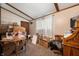 Bedroom cluttered with boxes, but featuring neutral walls and a wooden desk at 3335 W 400 N, Anderson, IN 46011