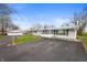 A well-kept home with a detached garage and large driveway at 3335 W 400 N, Anderson, IN 46011
