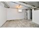 Unfinished basement with a water heater and window, ready for customization at 3516 N Capitol Ave, Indianapolis, IN 46208