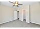 Bright bedroom featuring large windows and a ceiling fan offers a comfortable space at 3516 N Capitol Ave, Indianapolis, IN 46208
