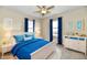 Bright bedroom with two windows, white furniture, and decor at 3516 N Capitol Ave, Indianapolis, IN 46208