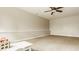 Spacious finished basement with plush carpeting, a ceiling fan, a table and chairs at 3640 Snowdon Dr, Westfield, IN 46074