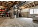 Unfinished basement with a concrete floor and walls with exposed ceiling, showing storage and utilities at 3640 Snowdon Dr, Westfield, IN 46074