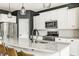 Contemporary kitchen featuring granite countertops, stainless steel appliances, and ample cabinet space at 3640 Snowdon Dr, Westfield, IN 46074