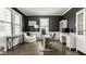 Stylish office with large windows, built-in shelving, and modern furnishings at 3640 Snowdon Dr, Westfield, IN 46074