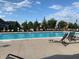 Community pool with lounge chairs for relaxing by the water at 3640 Snowdon Dr, Westfield, IN 46074
