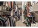Organized walk-in closet with ample storage, including shelving and hanging space for clothes at 3640 Snowdon Dr, Westfield, IN 46074