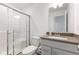 Bathroom with a walk-in shower, vanity with modern fixtures, and white cabinets at 3737 Planck St, Danville, IN 46122