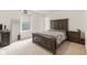 Bedroom with natural light featuring a full sized bed, dark furniture and modern decor at 3737 Planck St, Danville, IN 46122