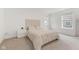 Cozy bedroom with neutral tones, carpet, large bed, and bright windows at 3737 Planck St, Danville, IN 46122