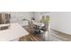 Bright dining area featuring hardwood floors, elegant seating, and natural light at 3737 Planck St, Danville, IN 46122