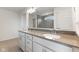 Bright bathroom with a double vanity, modern sinks and light countertop at 3737 Planck St, Danville, IN 46122