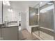 Modern main bathroom featuring a glass enclosed shower, neutral tile, and a light vanity at 3737 Planck St, Danville, IN 46122
