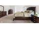 Comfortable main bedroom with soft carpet, neutral decor, and a large comfortable bed at 3737 Planck St, Danville, IN 46122