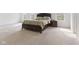 Bright main bedroom featuring a large bed, nightstand, and windows with natural light at 3737 Planck St, Danville, IN 46122