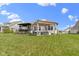 Large backyard with a covered patio and pergola seating, ideal for outdoor enjoyment at 3840 Shady Lake Dr, Westfield, IN 46074