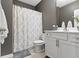 Bathroom with neutral walls, white shower curtain, and white vanity at 3840 Shady Lake Dr, Westfield, IN 46074