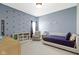 Well-lit blue bedroom with a comfortable bed and stylish decor at 3840 Shady Lake Dr, Westfield, IN 46074