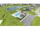 Community pool and recreational area with a pool, playground, and picnic area by the pond at 3840 Shady Lake Dr, Westfield, IN 46074