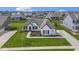 Charming one-story home boasts a well-manicured lawn and tasteful landscaping at 3840 Shady Lake Dr, Westfield, IN 46074