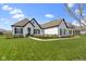 Charming one-story home boasts a well-manicured lawn and tasteful landscaping at 3840 Shady Lake Dr, Westfield, IN 46074