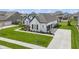 Charming one-story home boasts an attached garage, lawn and landscape at 3840 Shady Lake Dr, Westfield, IN 46074