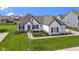 Charming one-story home boasts a well-manicured lawn and tasteful landscaping at 3840 Shady Lake Dr, Westfield, IN 46074