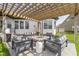 Outdoor patio with pergola, seating, and fire pit for entertaining at 3840 Shady Lake Dr, Westfield, IN 46074