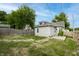 Backyard with wooden fence, green grass, and stepping stones at 3902 N Capitol Ave, Indianapolis, IN 46208
