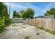 View of backyard featuring a wooden fence and concrete parking pad at 3902 N Capitol Ave, Indianapolis, IN 46208