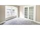 Bedroom boasts natural light from a bay window, and a doorway to closet with modern double doors at 3902 N Capitol Ave, Indianapolis, IN 46208