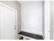 Charming entryway with built-in bench, coat hooks, and storage underneath for organization at 3902 N Capitol Ave, Indianapolis, IN 46208