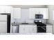 Well-equipped kitchen with stainless steel appliances and granite countertops at 3902 N Capitol Ave, Indianapolis, IN 46208