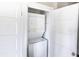 Conveniently located laundry closet with stacked washer and dryer at 3902 N Capitol Ave, Indianapolis, IN 46208