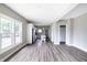 Spacious living room with hardwood floors and large windows at 3902 N Capitol Ave, Indianapolis, IN 46208