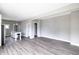 Open concept living room with hardwood floors and great natural light at 3902 N Capitol Ave, Indianapolis, IN 46208