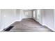 Bright, open living room featuring modern flooring and neutral paint, with great natural light at 3902 N Capitol Ave, Indianapolis, IN 46208
