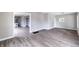 Large living room with hardwood floors that offers a versatile space at 3902 N Capitol Ave, Indianapolis, IN 46208