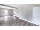 Spacious living room with durable floors and ample natural light, plus neutral paint at 3902 N Capitol Ave, Indianapolis, IN 46208
