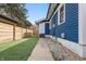 Backyard with a wooden fence and lush artificial turf at 3967 N Park Ave, Indianapolis, IN 46205