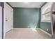 Bedroom featuring tile floors, white door, and neutral colors at 3967 N Park Ave, Indianapolis, IN 46205