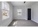 Bright bedroom features two windows and a neutral color scheme at 3967 N Park Ave, Indianapolis, IN 46205