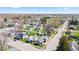 An aerial view of a residential neighborhood on a sunny day with mature trees at 401 N Swope St, Greenfield, IN 46140