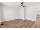 This bedroom has wood floors, neutral paint, and has easy access to the kitchen at 401 N Swope St, Greenfield, IN 46140