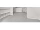 This bonus room has carpet and built in shelving at 401 N Swope St, Greenfield, IN 46140