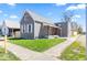 A charming single-Gathering home with a covered front porch and a well-manicured lawn at 401 N Swope St, Greenfield, IN 46140