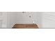 This laundry room has vinyl flooring, white walls, and a clean design at 401 N Swope St, Greenfield, IN 46140