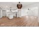 Open-concept space featuring a modern kitchen, dining, and living area with beautiful laminate flooring throughout at 401 N Swope St, Greenfield, IN 46140