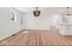 A bright living room featuring hardwood floors, fresh paint, and open concept floorplan at 401 N Swope St, Greenfield, IN 46140