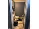 Cozy half-bathroom with white fixtures and modern flooring, conveniently located for guests at 415 E 32Nd St, Indianapolis, IN 46205